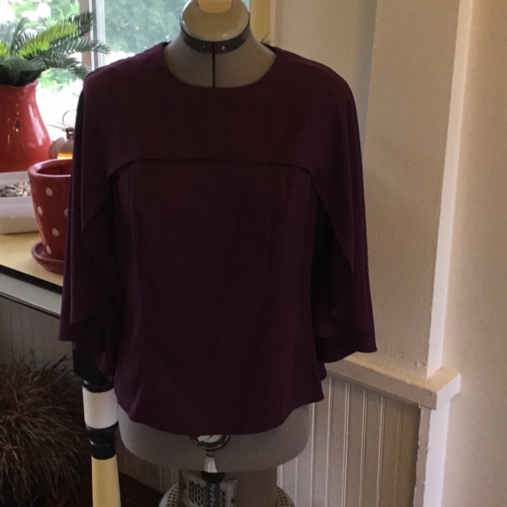 Venus sleeveless caped blouse
